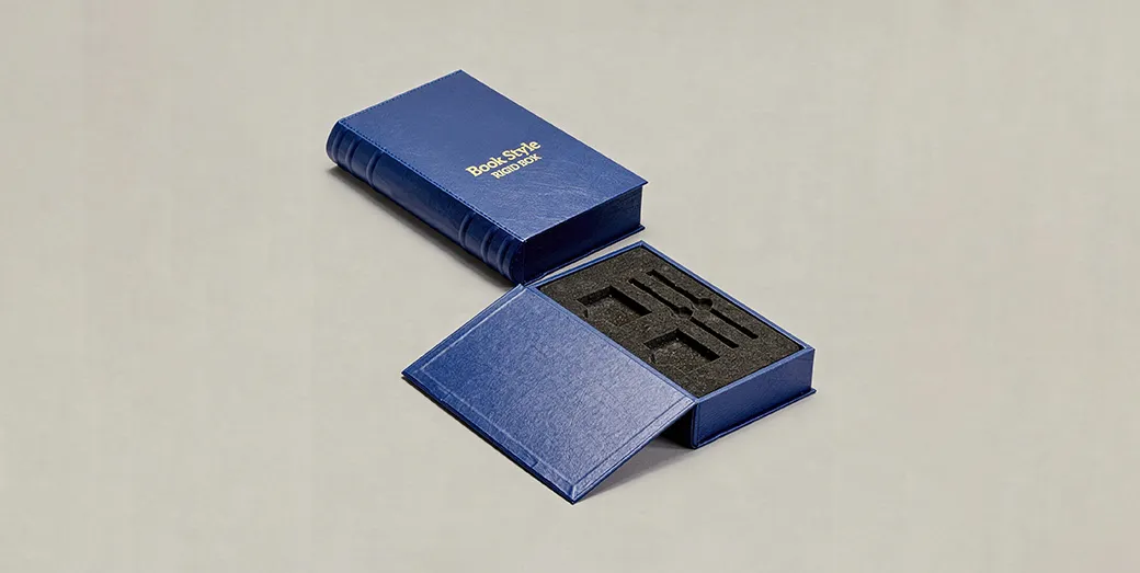 Book-style rigid box with magnetic or ribbon closure