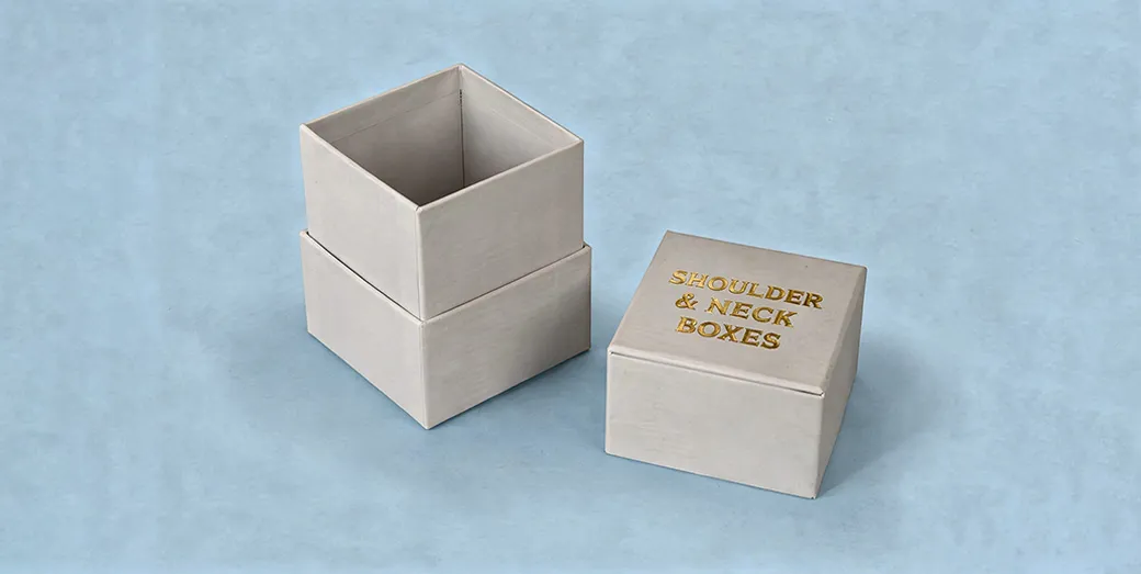 Shoulder and neck rigid box with snug-fitting lid for luxury packaging